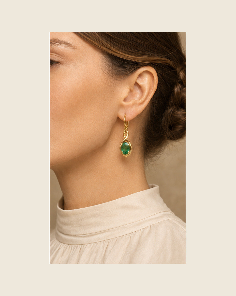 Aurea Forma Drops — Emerald — shown worn by a woman for scale