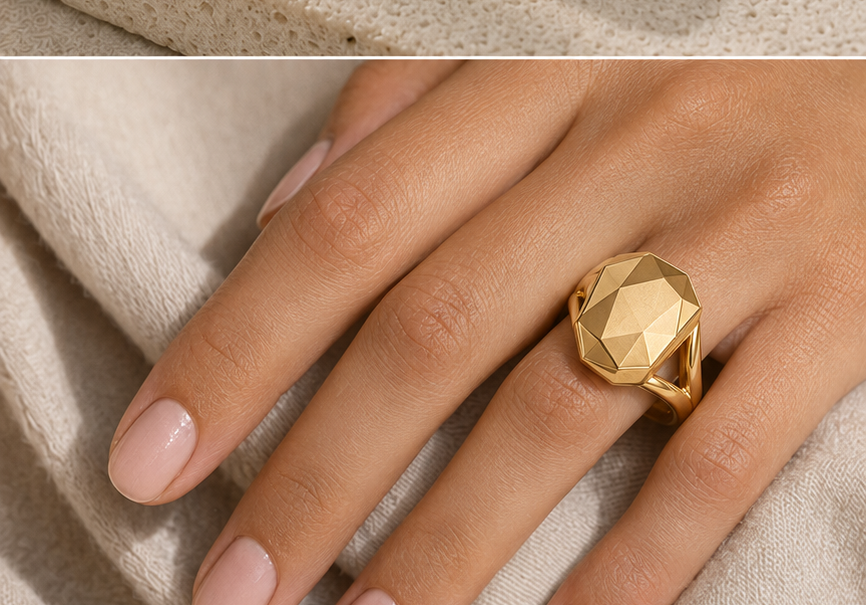 Crowncut Grand solid gold ring worn on a woman's hand