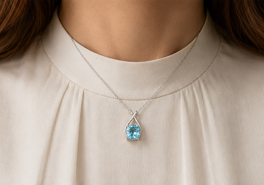 Crownline Aquamarine Intimate pendant worn by a woman
