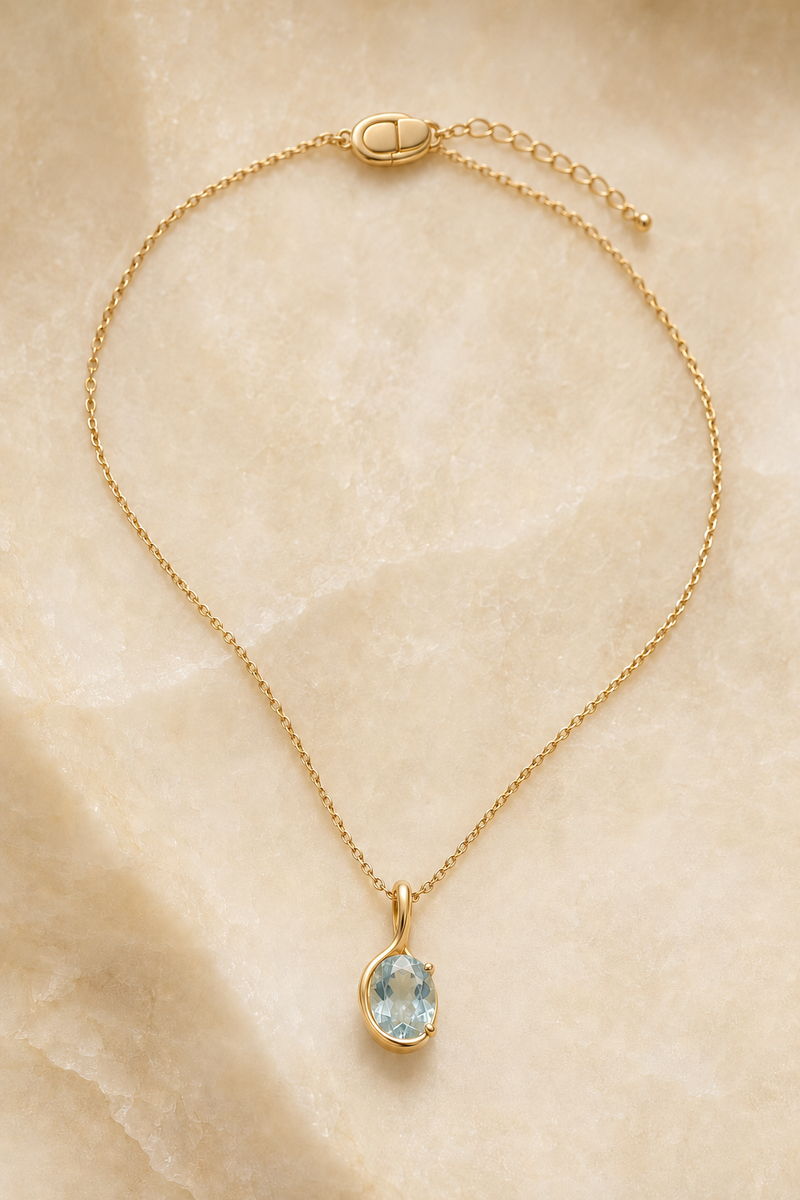 Veil Aquamarine Petal Necklace — 14k Gold product visualization on warm alabaster