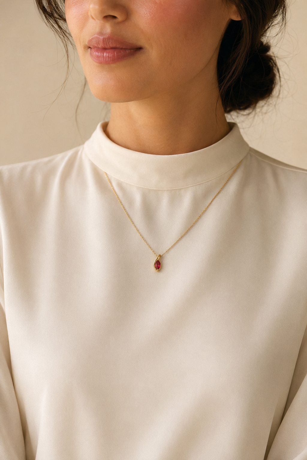 Adult woman wearing Veil Ruby Thread Necklace — 14k Gold at approximate scale with modest ivory styling