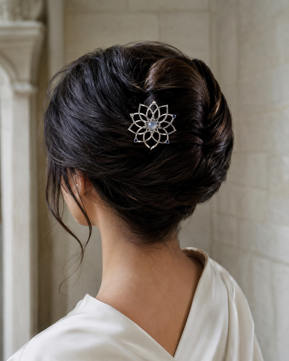 Forgemier Lotus Lattice Hair Comb in sterling silver with moonstone and blue sapphires, shown worn to scale