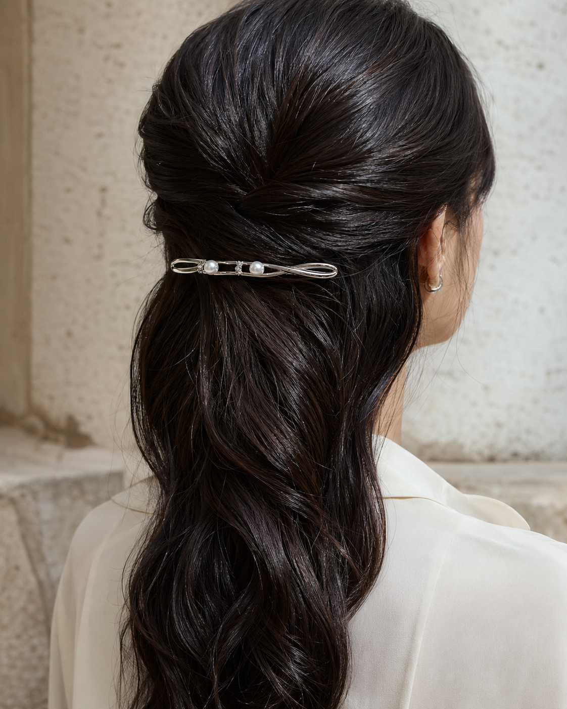 Forgemier Pearl Orbit Barrette in sterling silver with two captive pearls and lab-grown diamonds, shown worn to scale