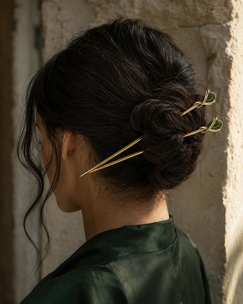 Forgemier Vinekeeper Hair Sticks in 14k yellow gold with green tourmaline, shown worn to scale