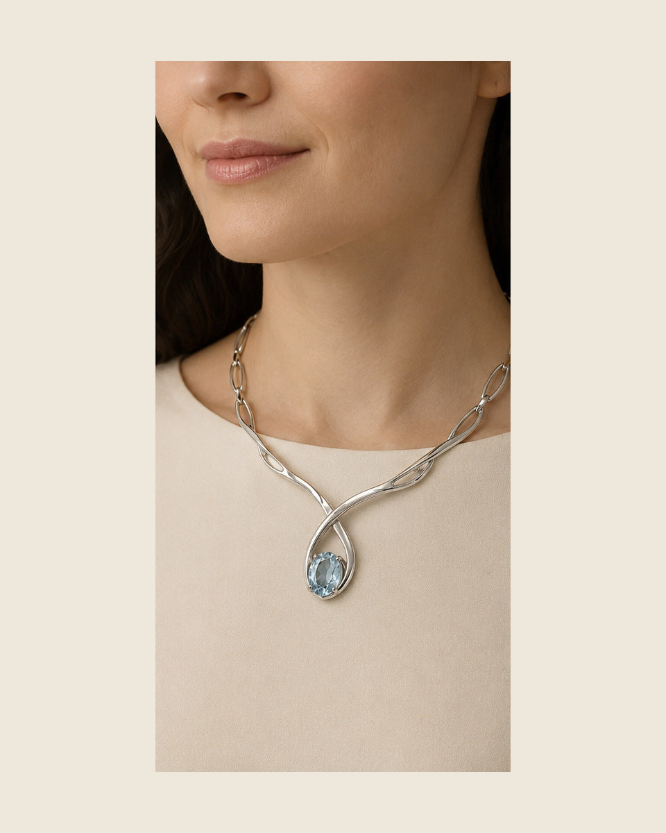 Lilt Forma Collar — Aquamarine — shown worn by a woman for scale
