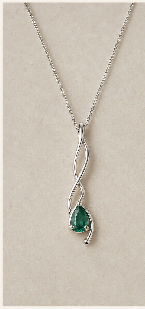 Lilt Tendril Necklace — Emerald — product portrait