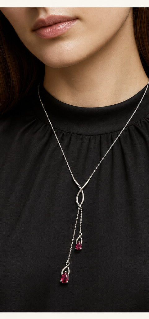 Lilt Thread Lariat — Ruby — shown worn by a woman for scale